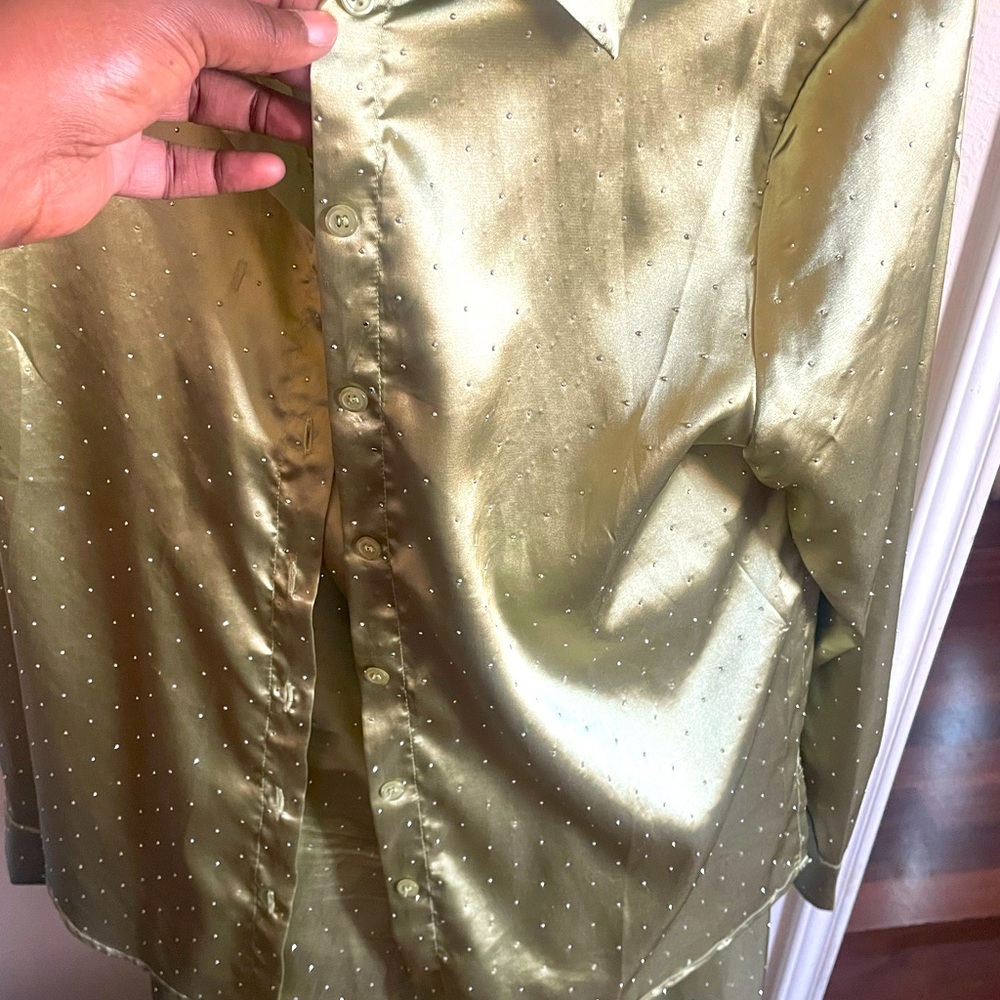 Satin top and matching pants. Rhinestone detail top to bottom. Super cute